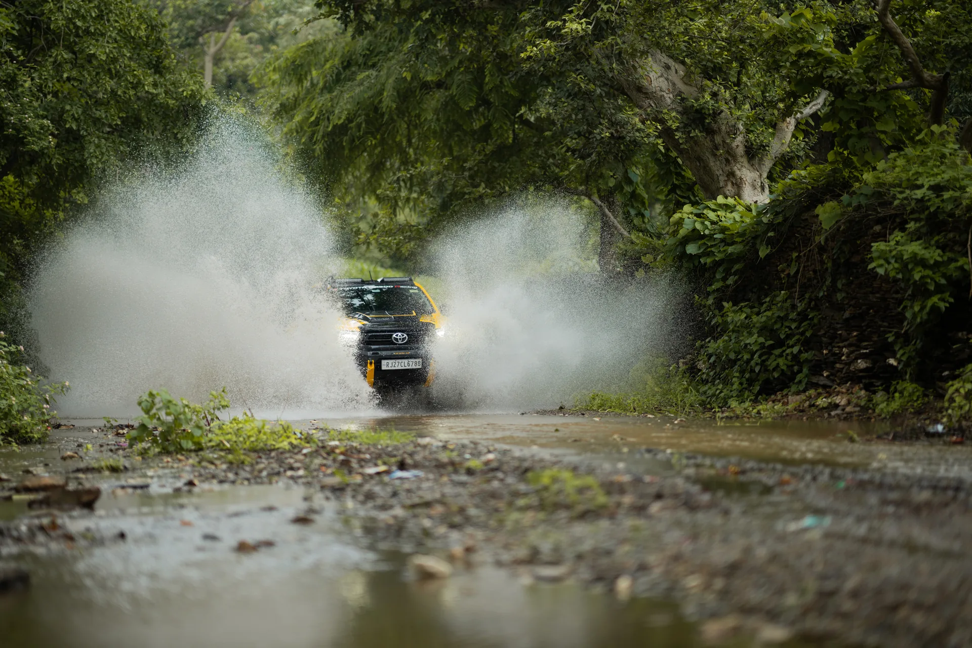 Off-road vehicle moving through a water test