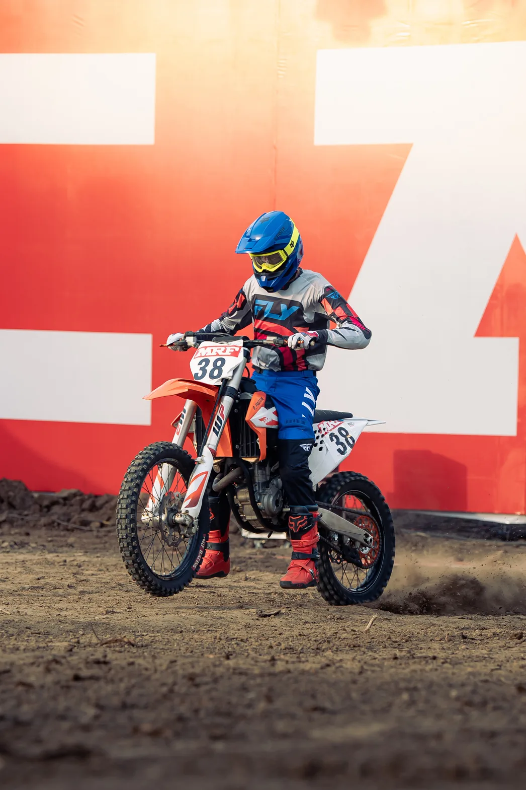 Motocross rider performing during a live event