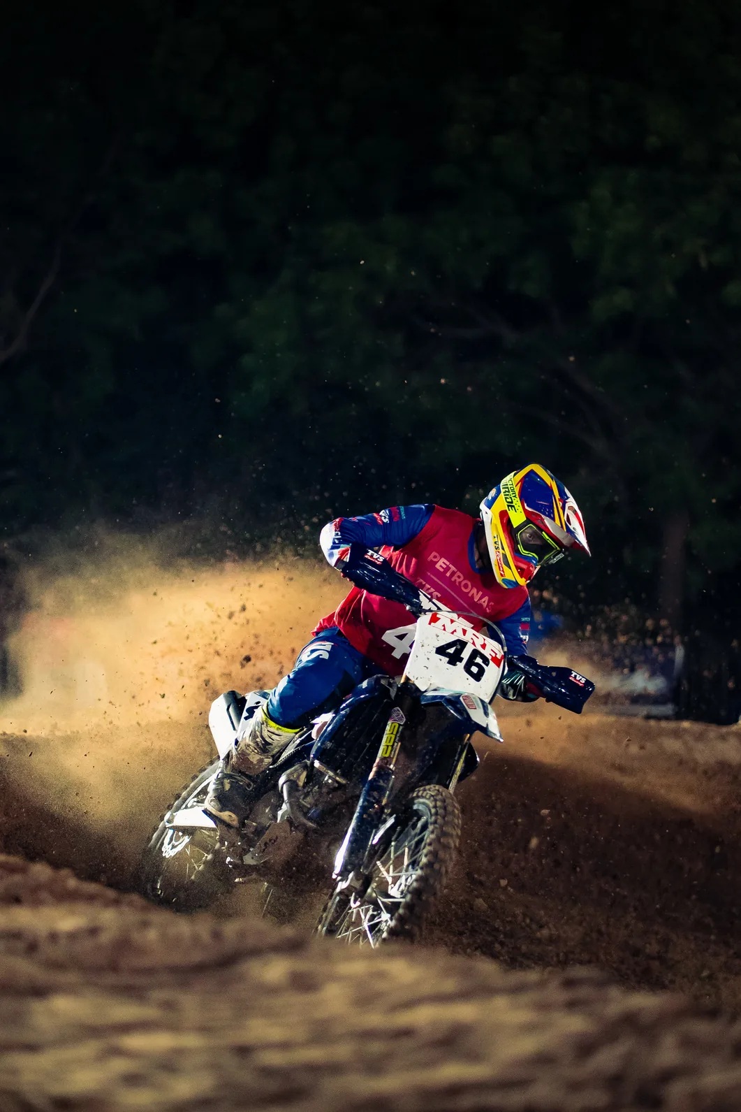Rally rider captured during a night stage
